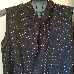 NWT Black with white dots sleeveless blouse. Size medium fits larger